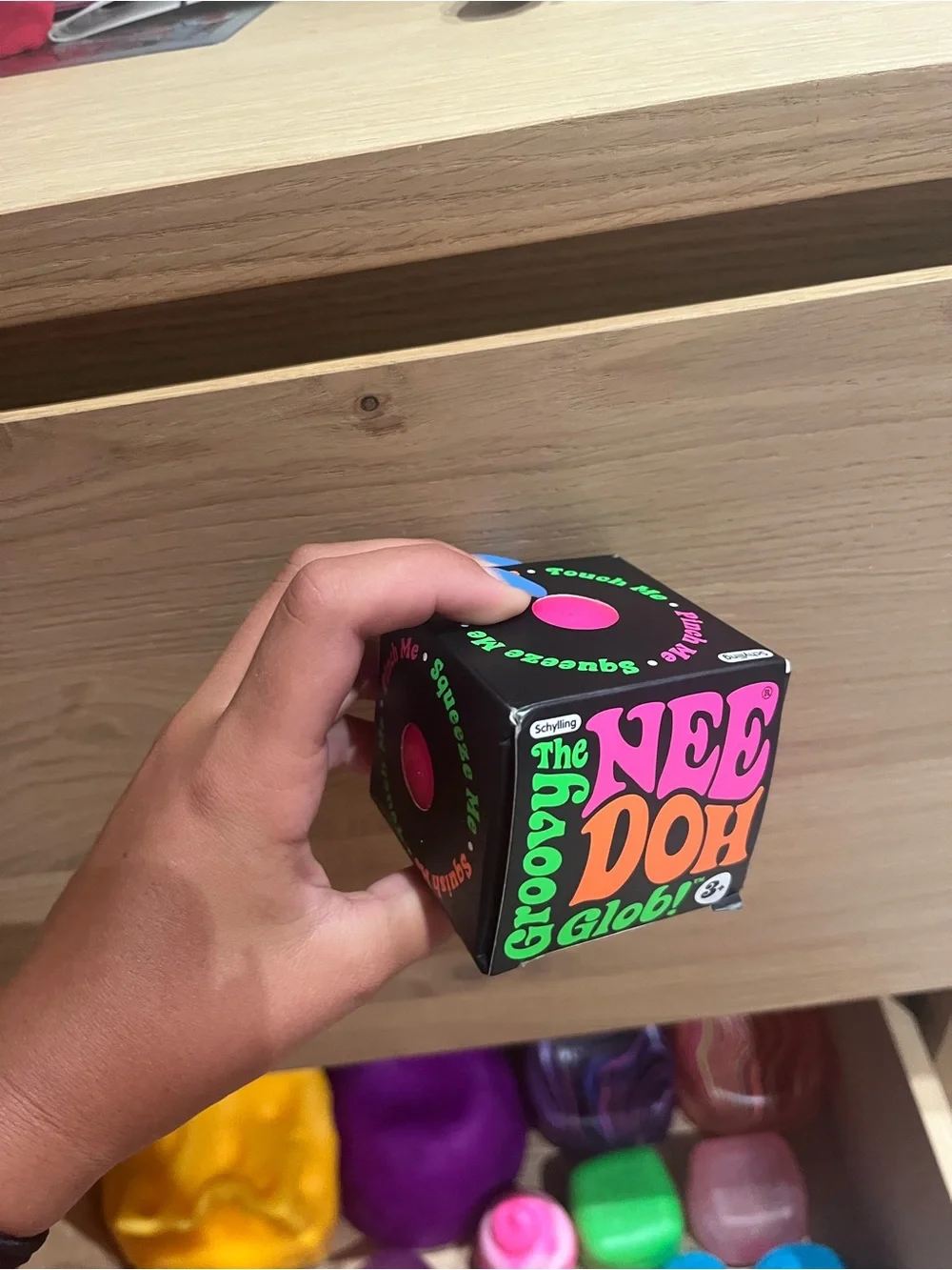 Groovy Glob Squeeze Toy - Black with Pink & Orange Accents needoh